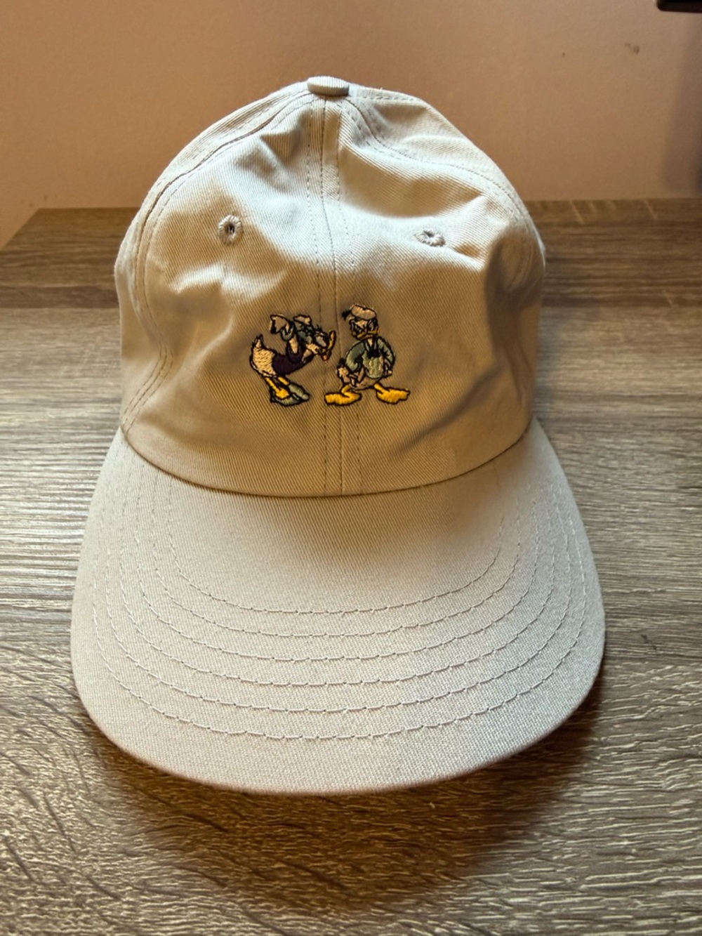 Love Your Melon x Disney Grey Baseball Cap with Embroidered Donald and Daisy.